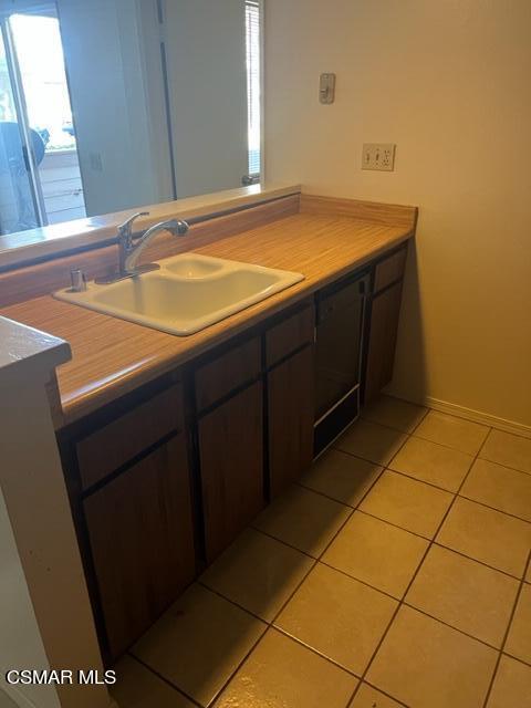 4573 Alamo Street, Unit D Simi Valley, CA 93063 - Photo 5 of 30 a bathroom with a sink and a mirror