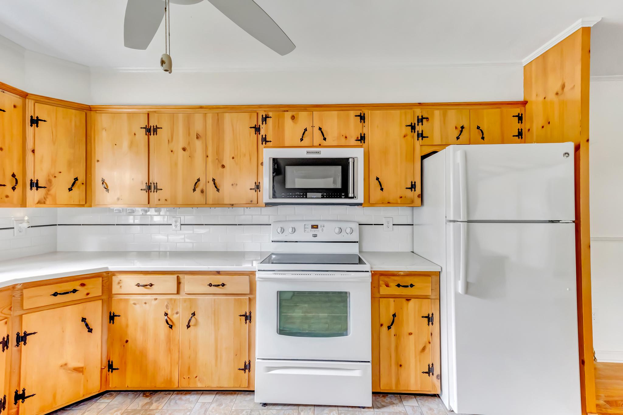 11163 Stewart Neck Road Princess Anne, MD 21853 - Photo 12 of 80 Charming kitchen with original, real wood cabinets