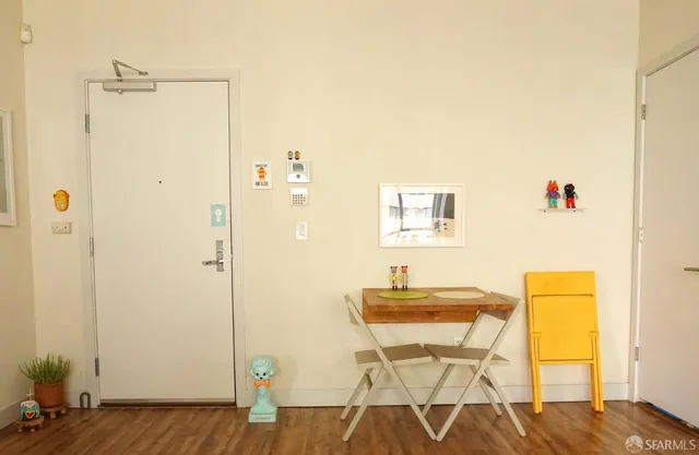 a workspace with furniture and wooden floor