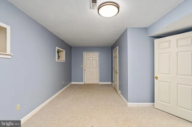 a kitchen with stainless steel appliances granite countertop a refrigerator a sink and a stove