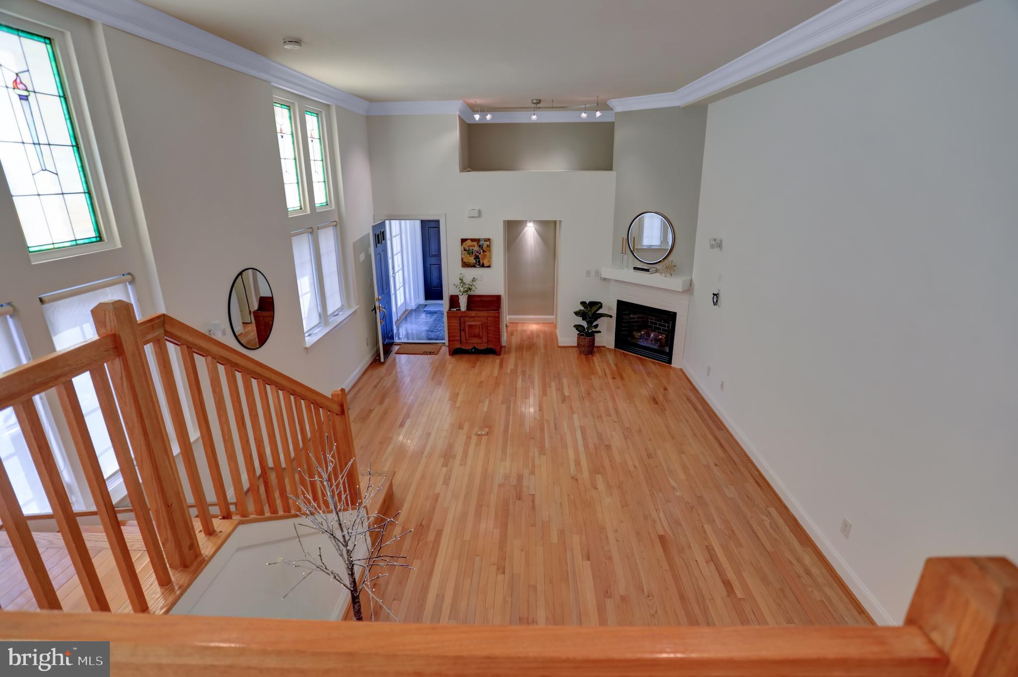 832 Trinity Street Baltimore, MD 21202 - Photo 3 of 60 oak flooring, note stained glass windows