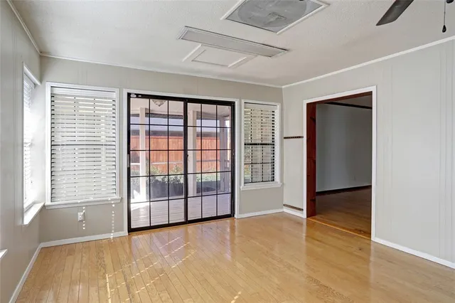 a kitchen with a sink stainless steel appliances and cabinets