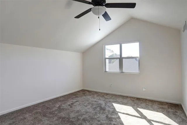 a bathroom with a tub a sink and a mirror