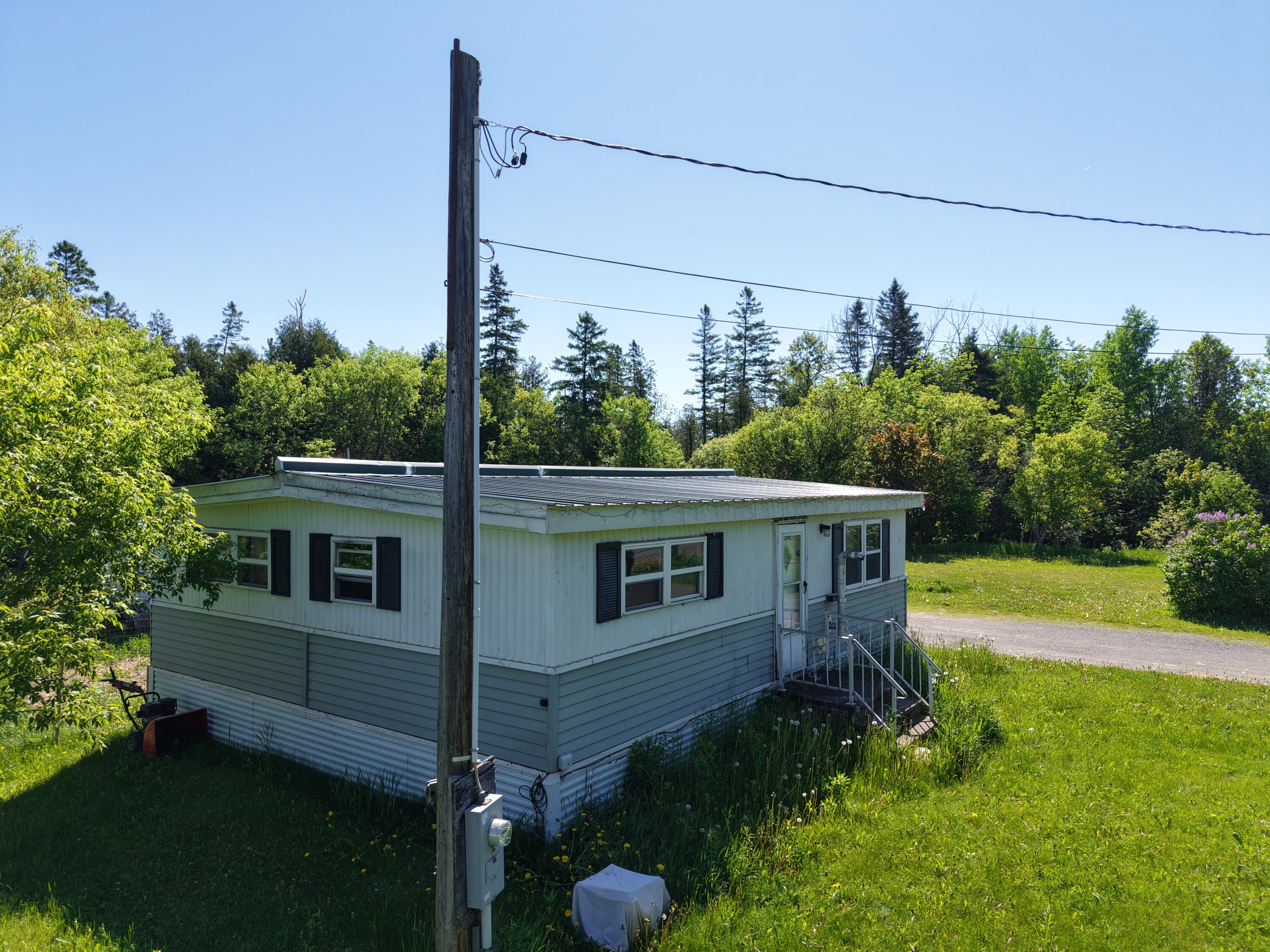 112 Robinson Road Blaine, ME 04734 - Photo 2 of 23 outside