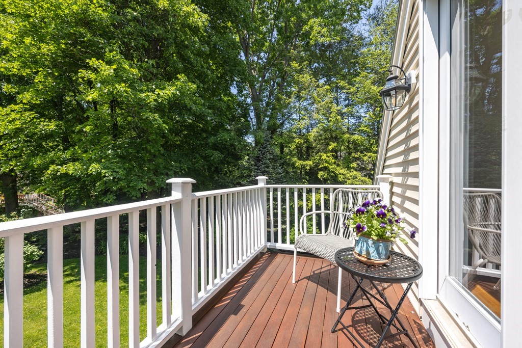 64 Reed Street Lexington, MA 02421 - Photo 4 of 12 a view of balcony with furniture