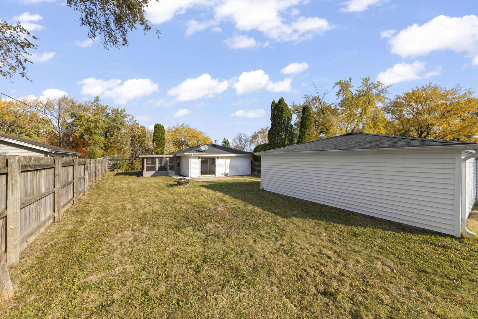 90 Pleasant Street Hoffman Estates, IL 60169 - Photo 24 of 43 a view of a house with a yard