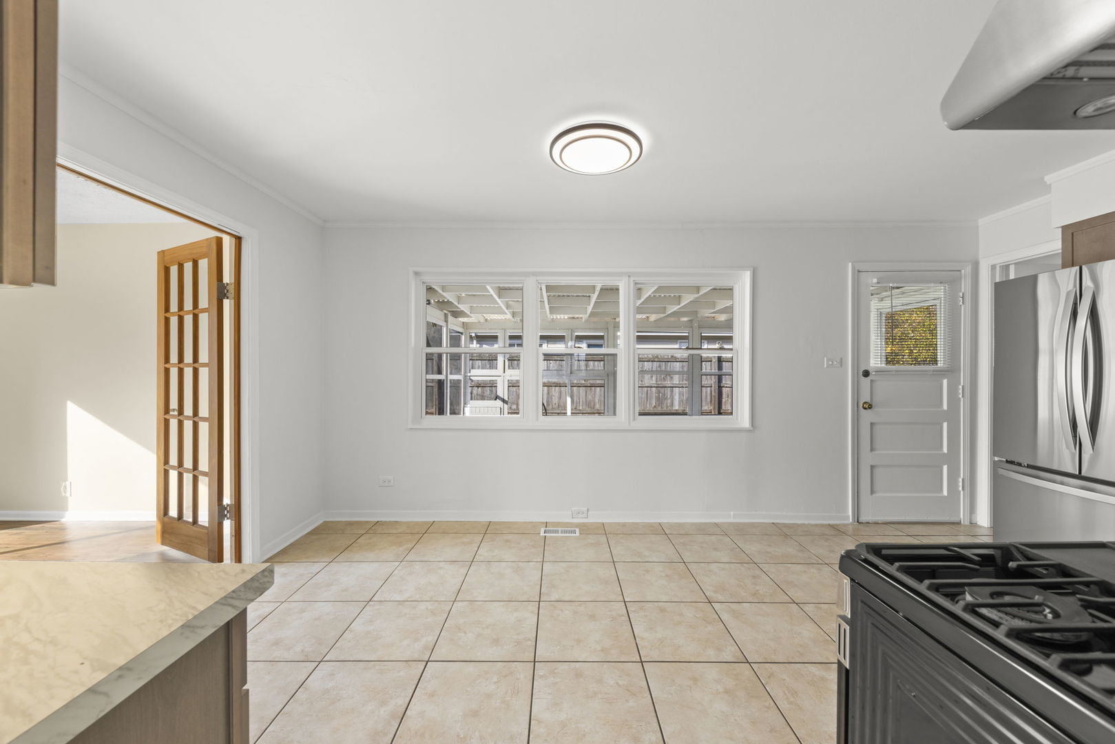 90 Pleasant Street Hoffman Estates, IL 60169 - Photo 7 of 43 a view of a livingroom with wooden floor and furniture
