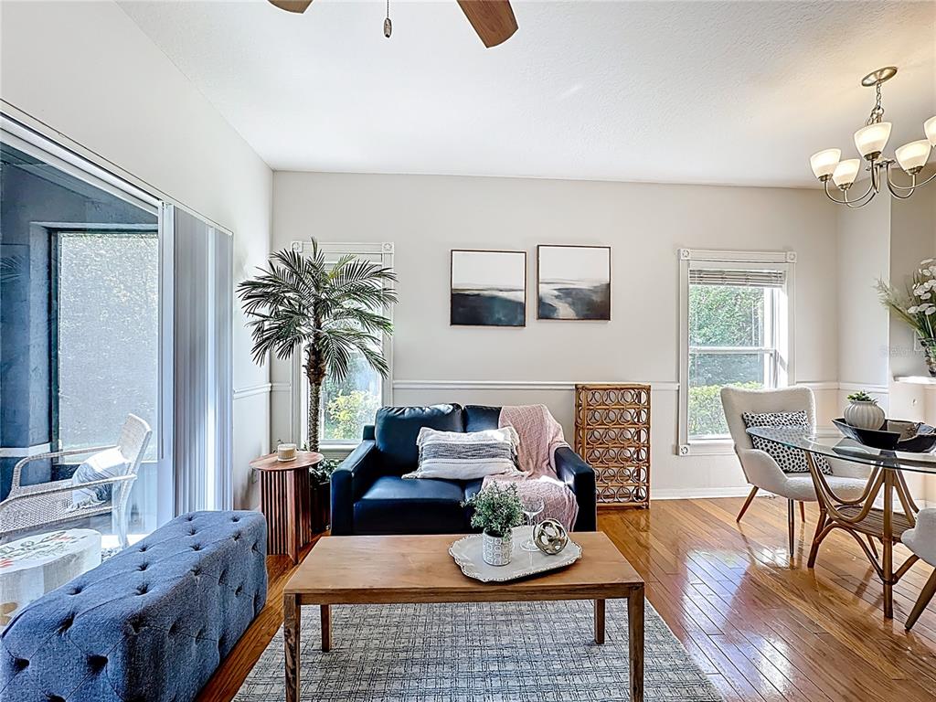 10300 Manderley Way, Unit 119 Orlando, FL 32829 - Photo 13 of 42 a living room with furniture