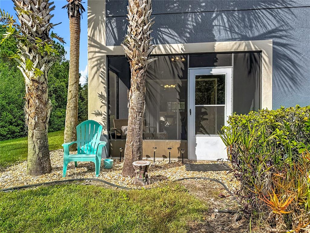 10300 Manderley Way, Unit 119 Orlando, FL 32829 - Photo 29 of 42 a view of a house with a patio