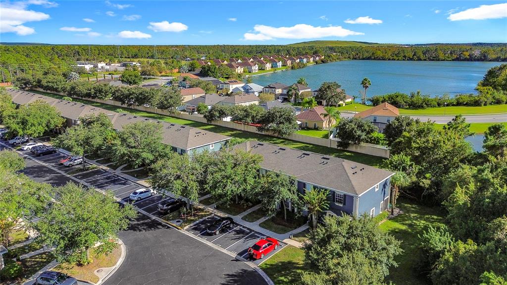 10300 Manderley Way, Unit 119 Orlando, FL 32829 - Photo 3 of 42 a view of a city and lake