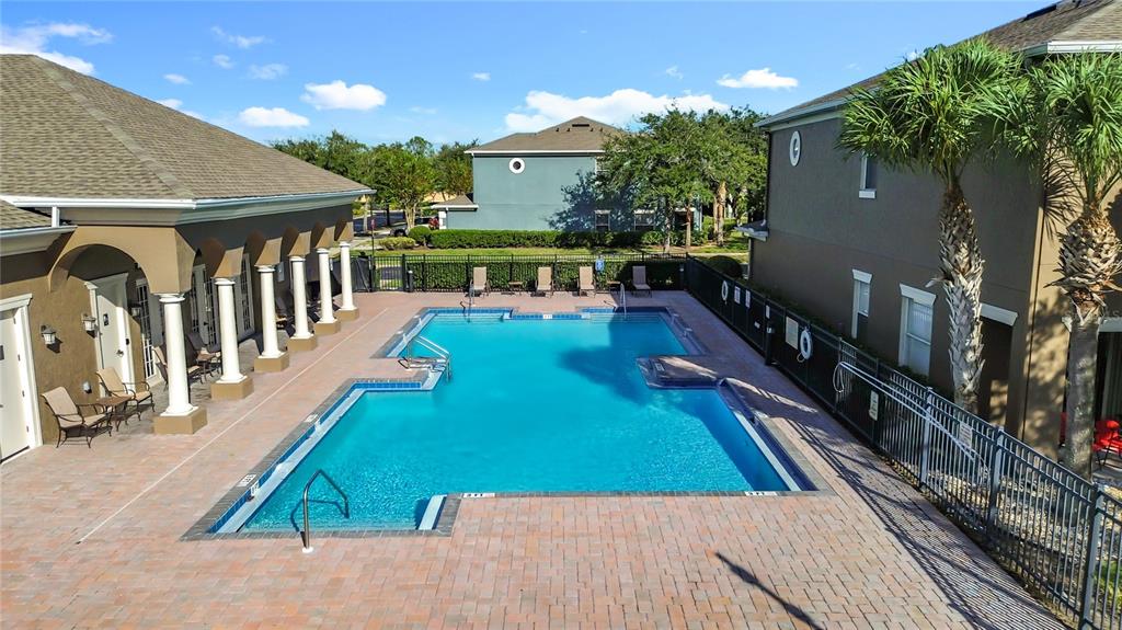 10300 Manderley Way, Unit 119 Orlando, FL 32829 - Photo 39 of 42 swimming pool view with a outdoor seating space