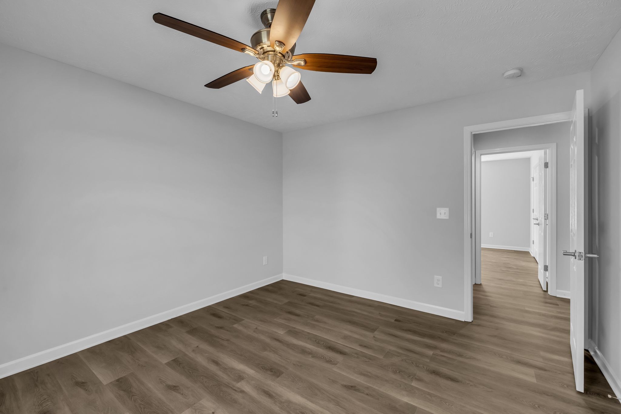 638 Summitville Road Manchester, TN 37355 - Photo 22 of 33 wooden floor in an empty room