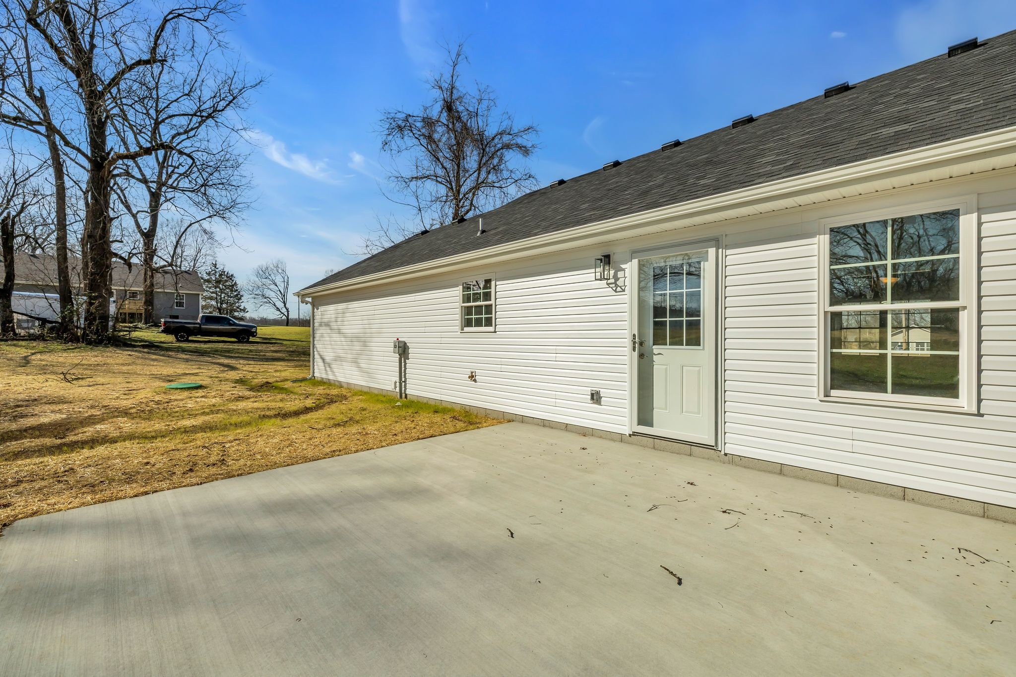 638 Summitville Road Manchester, TN 37355 - Photo 29 of 33 a view of a house with a backyard