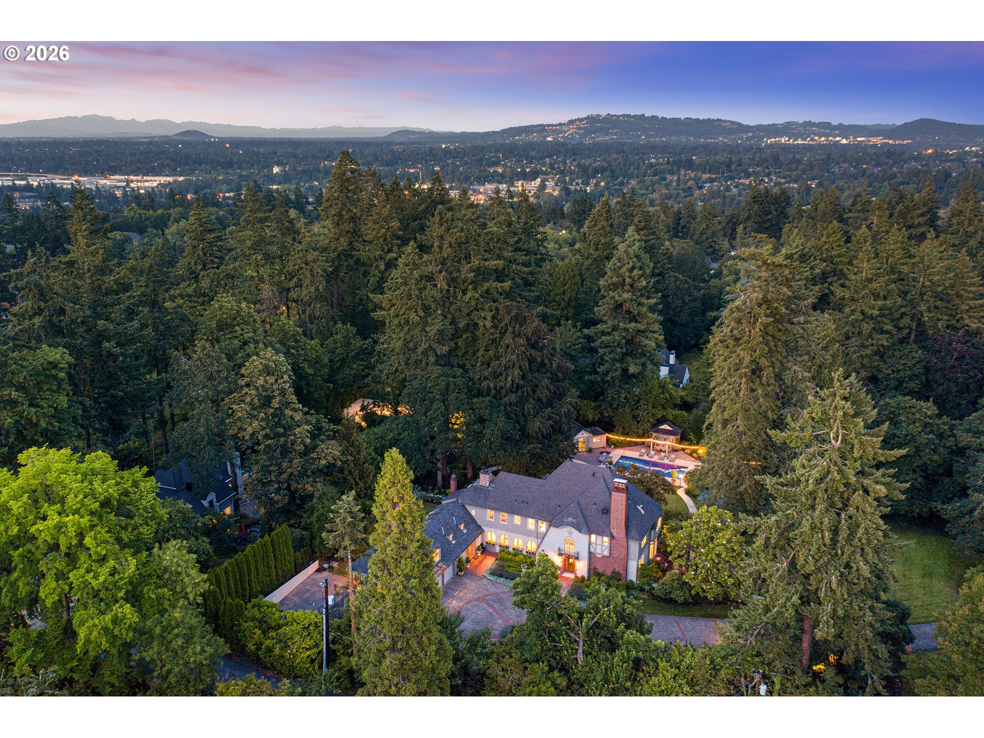 1905 South Greenwood Road Portland, OR 97219 - Photo 1 of 46 an aerial view of residential houses with outdoor space and trees