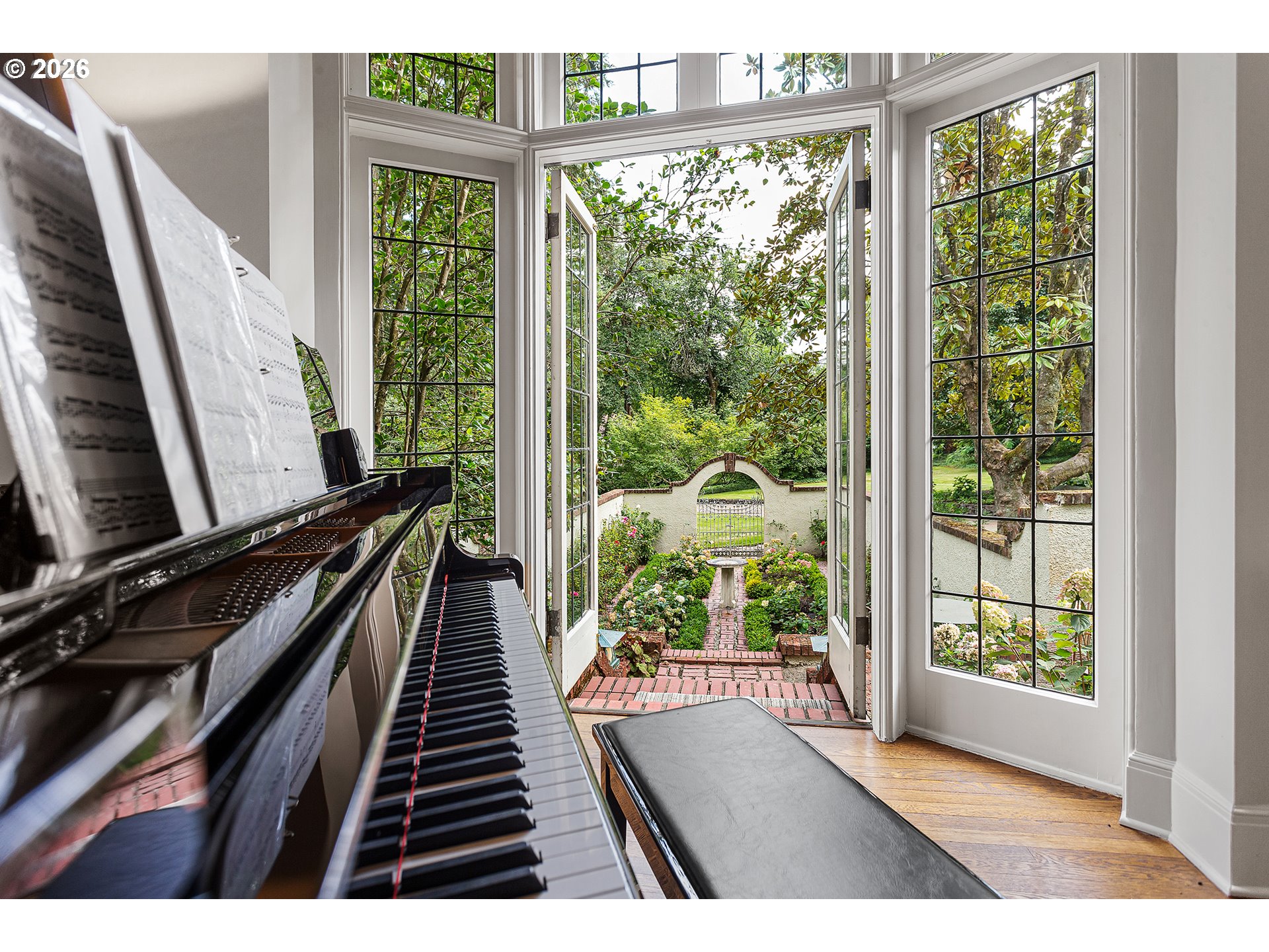 1905 South Greenwood Road Portland, OR 97219 - Photo 11 of 46 a view of a balcony with floor to ceiling windows and wooden floor