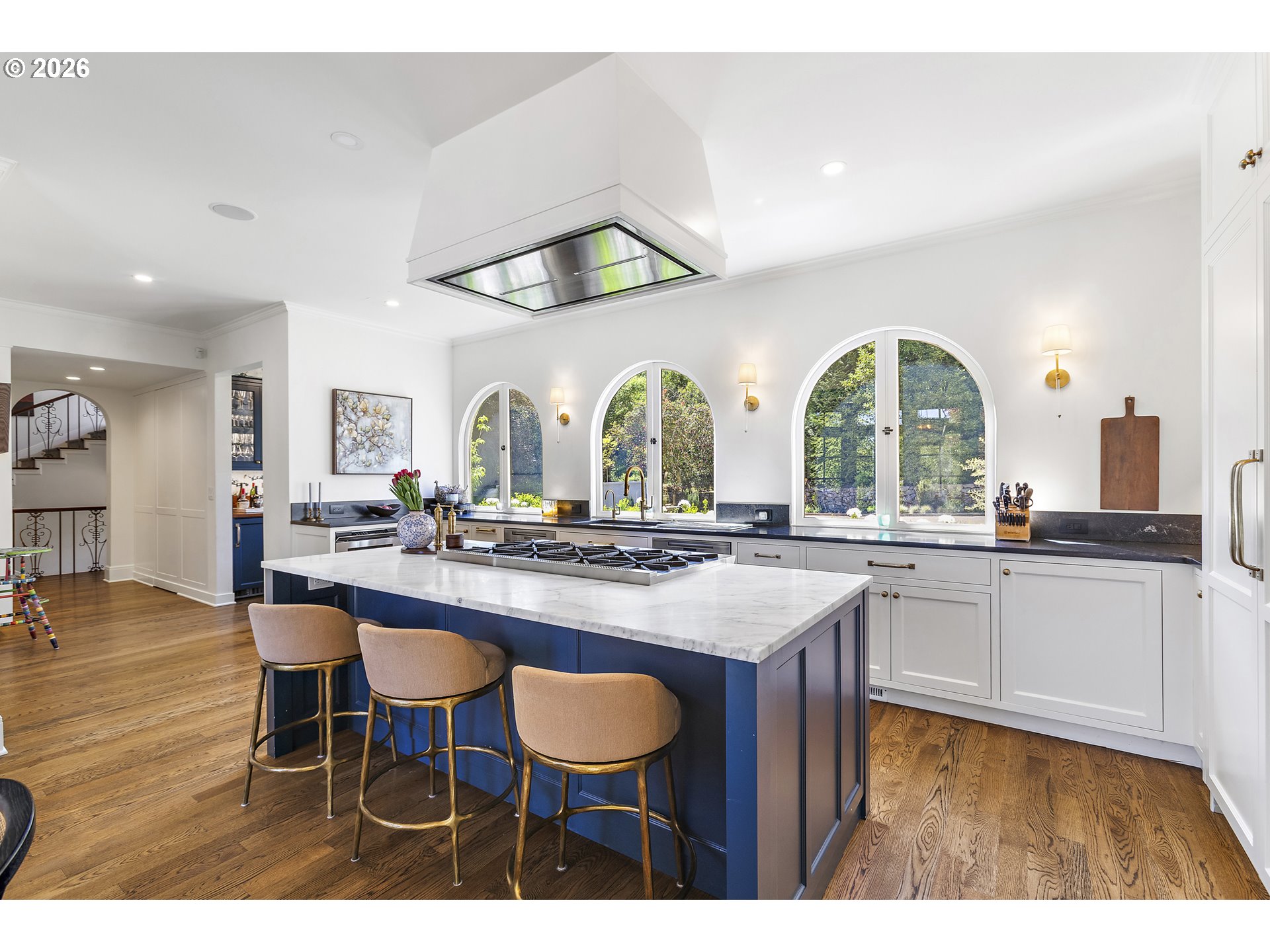 1905 South Greenwood Road Portland, OR 97219 - Photo 18 of 46 a kitchen with center island and wooden floor