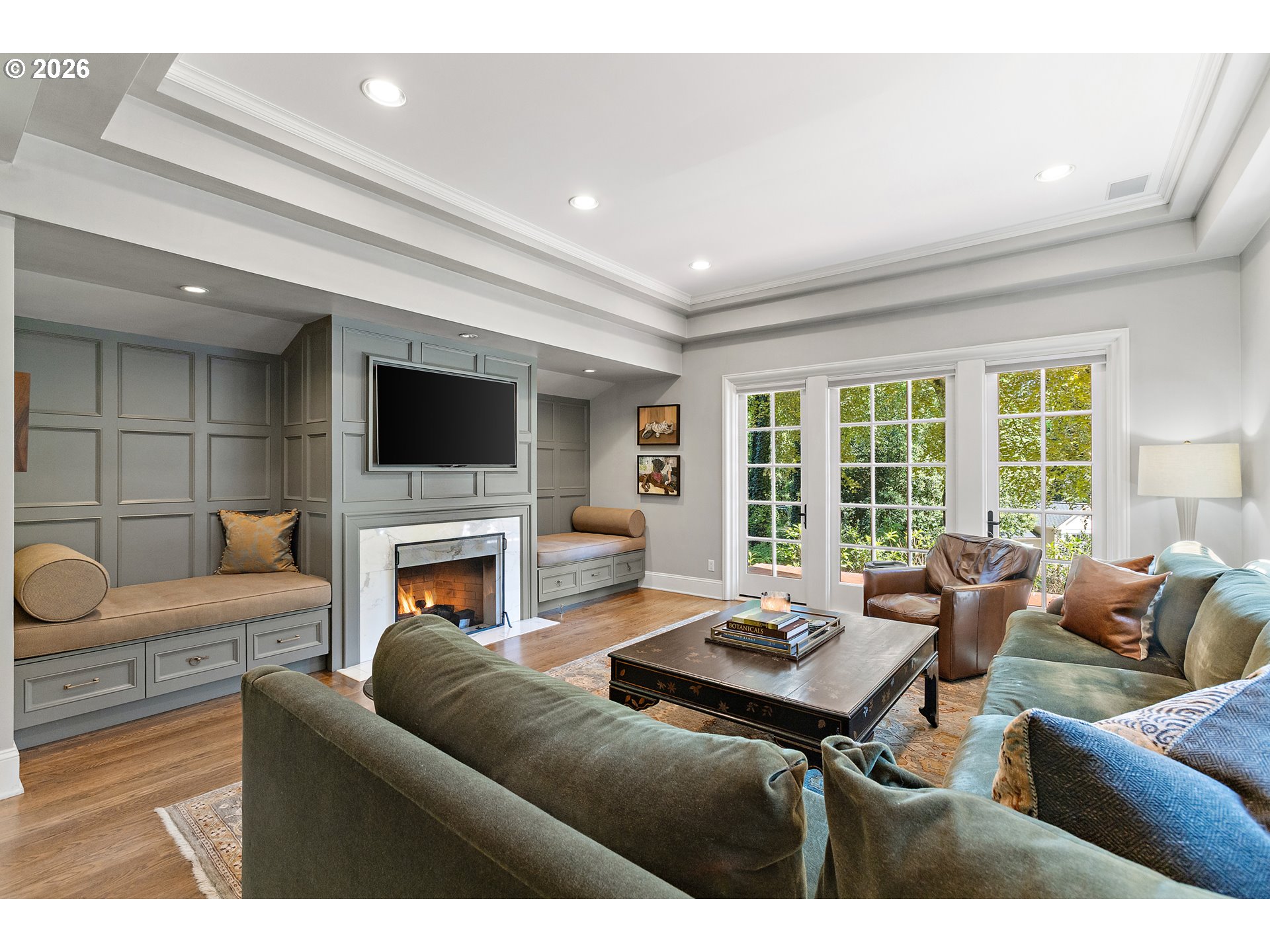 1905 South Greenwood Road Portland, OR 97219 - Photo 22 of 46 a living room with furniture and a fireplace