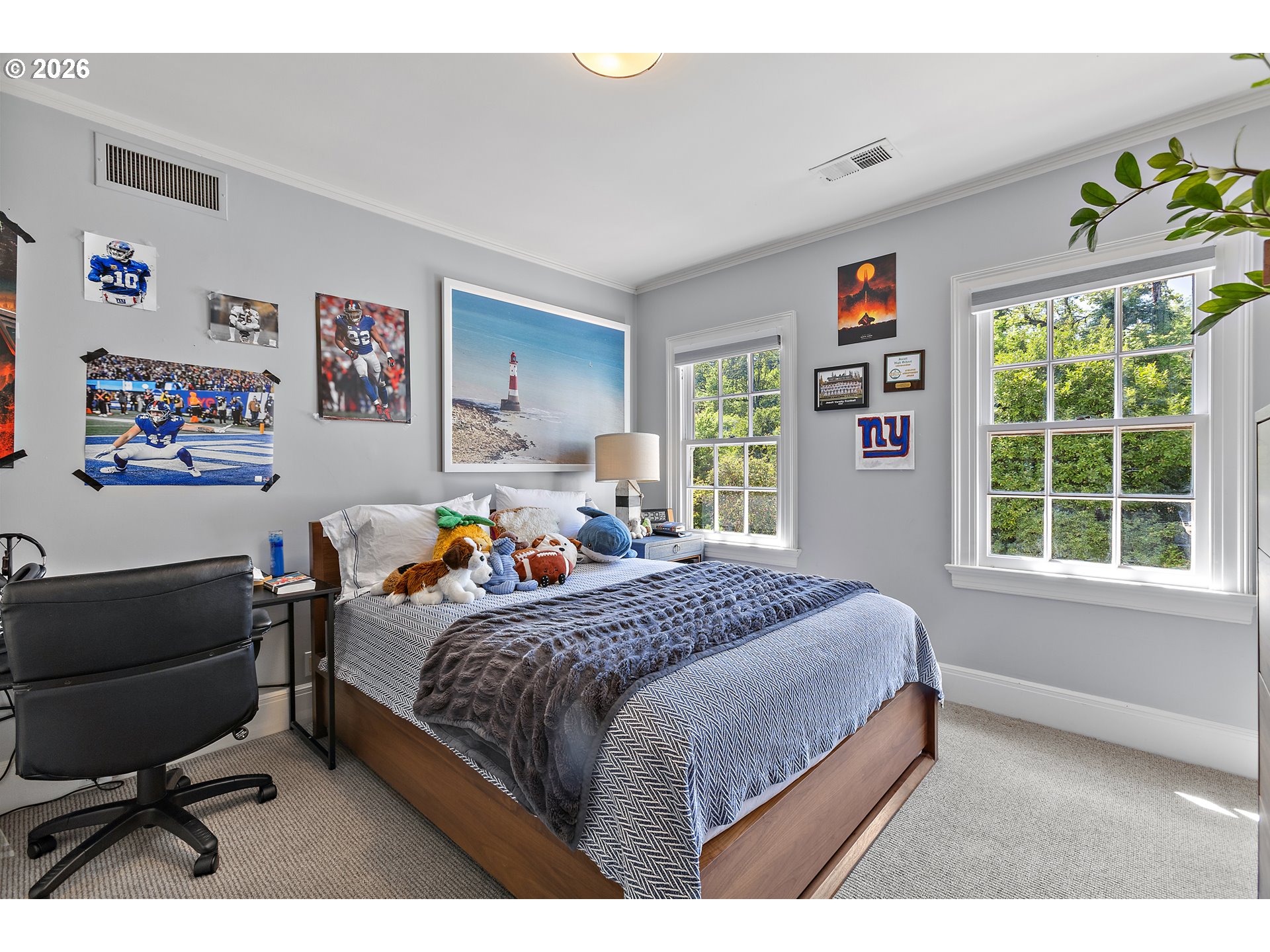 1905 South Greenwood Road Portland, OR 97219 - Photo 27 of 46 a bed room with a bed window and a chair