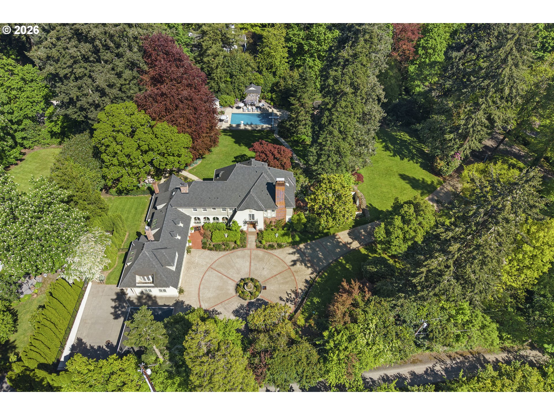 1905 South Greenwood Road Portland, OR 97219 - Photo 45 of 46 an aerial view of a house with a yard
