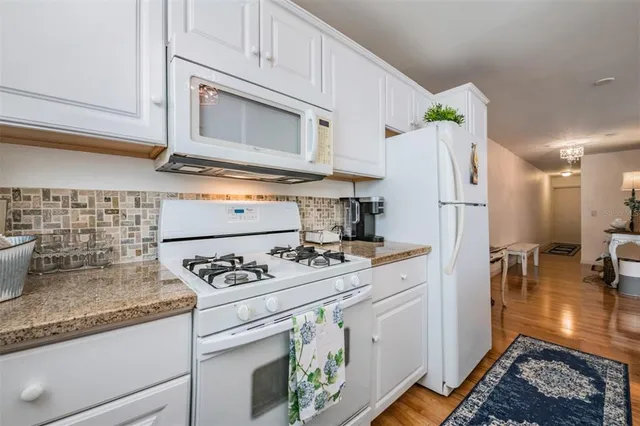 a bathroom with a sink toilet and a vanity