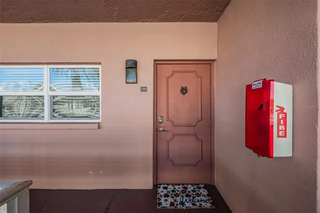 a sign that is sitting on the side of a building