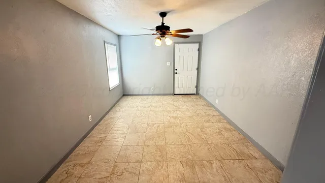 a view of hallway with a window