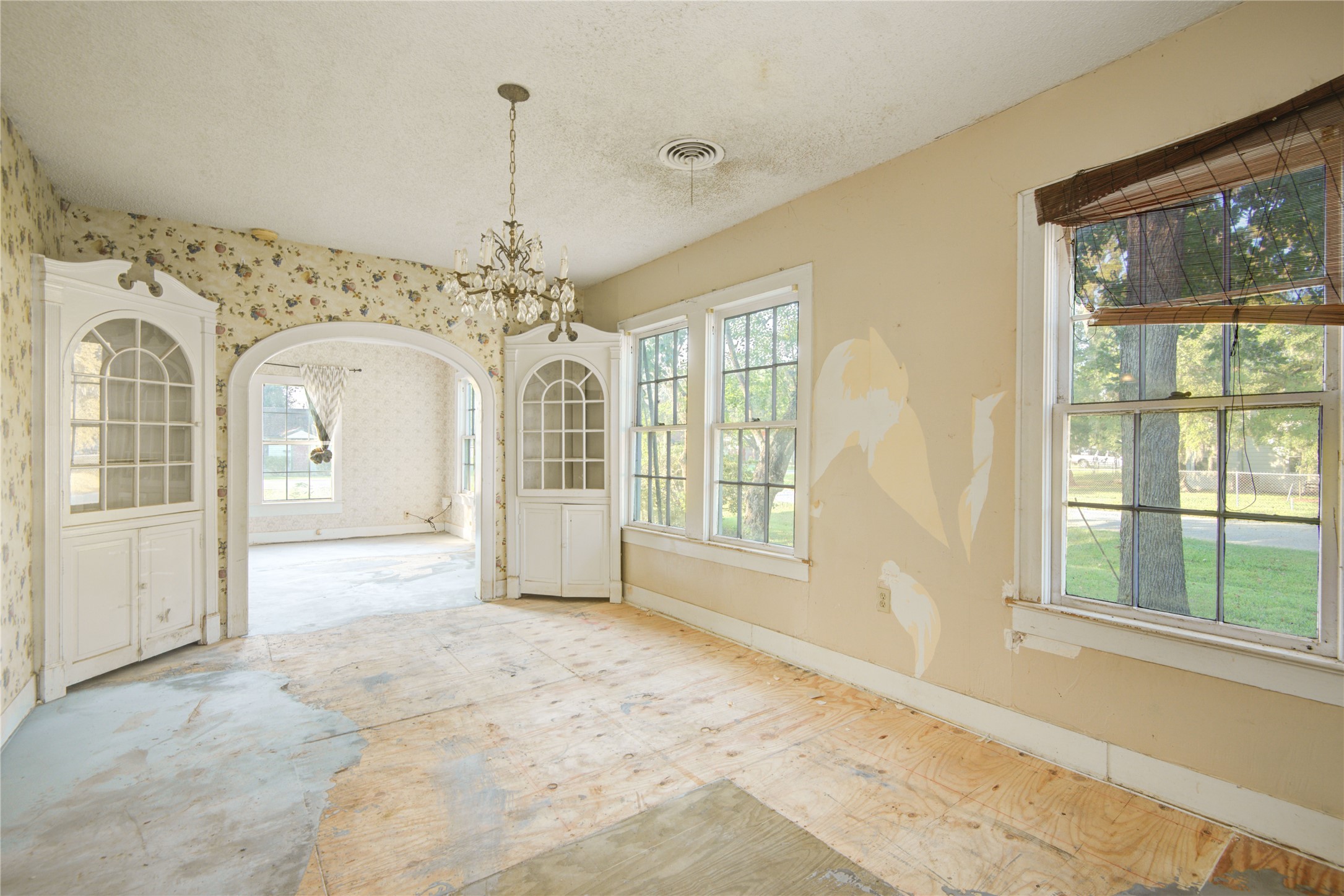 508 East 2nd Street Sweeny, TX 77480 - Photo 11 of 41 a view of a big room with windows and chandelier