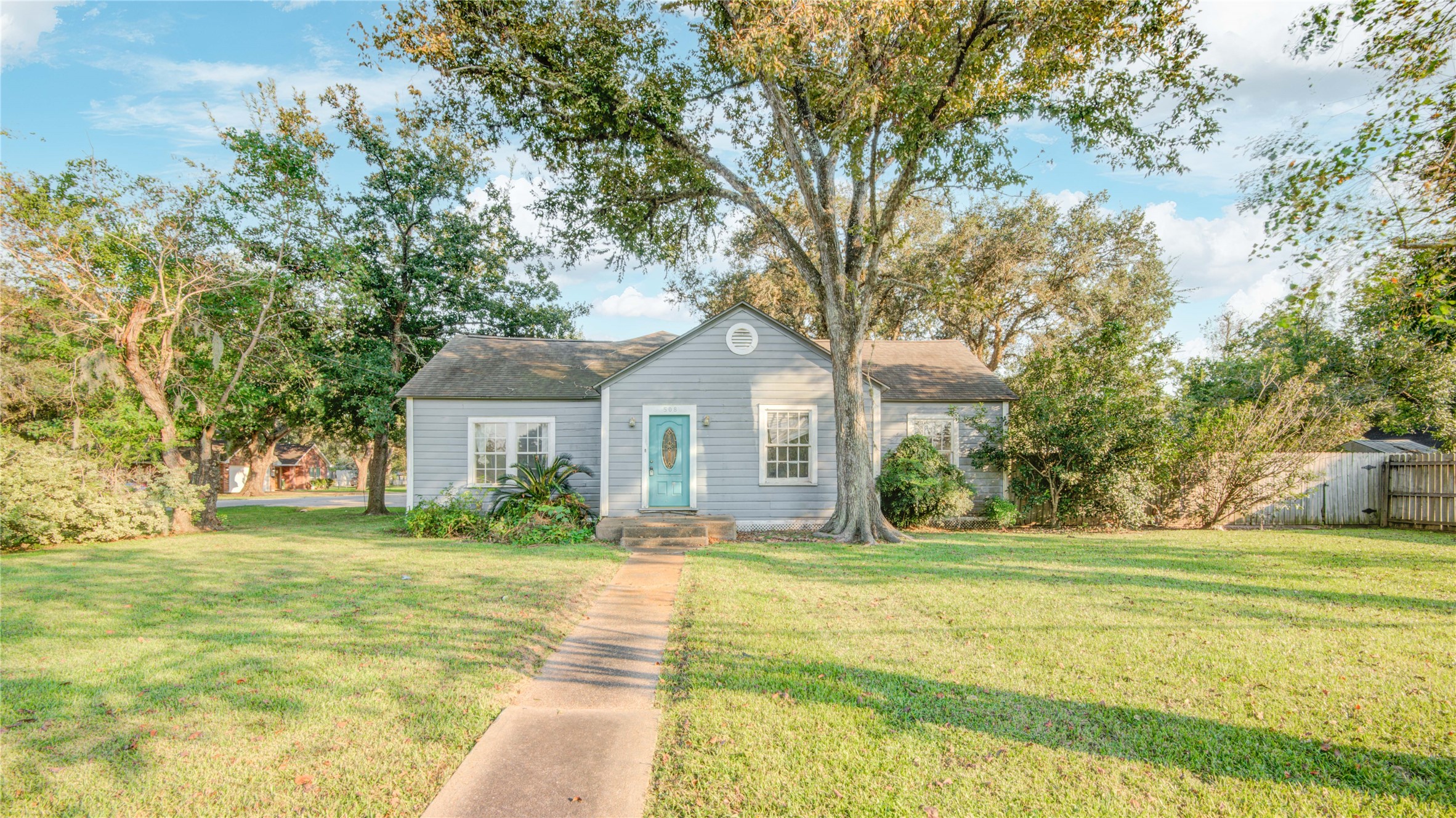 508 East 2nd Street Sweeny, TX 77480 - Photo 2 of 41 a front view of a house with a yard