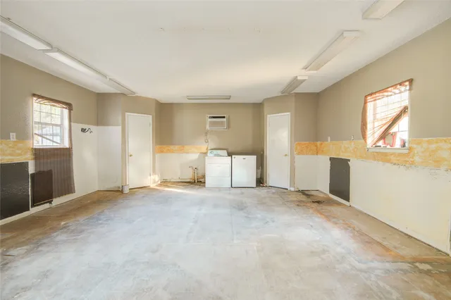 a view of empty room with a window