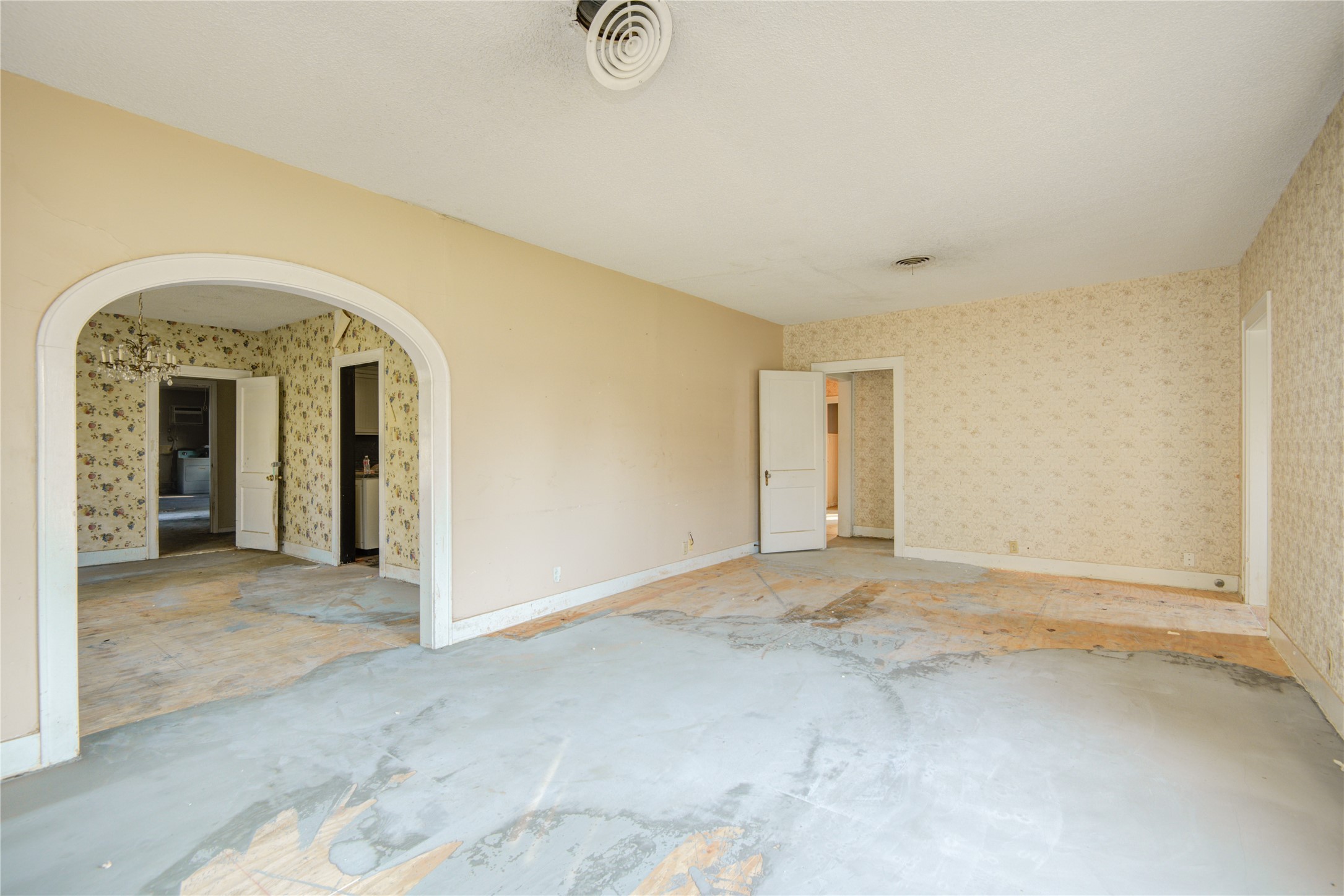 508 East 2nd Street Sweeny, TX 77480 - Photo 8 of 41 an empty room with a fireplace and a window
