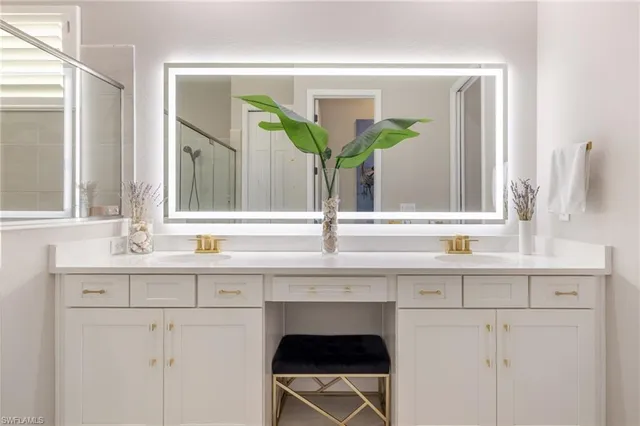 a sink with a window and kitchen view