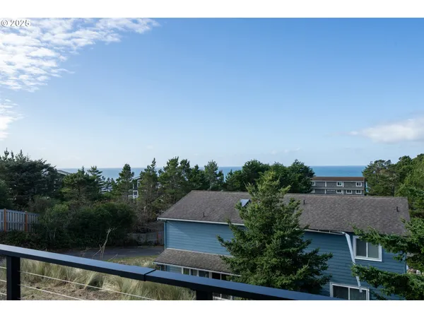 a view of house and outdoor space with swimming pool