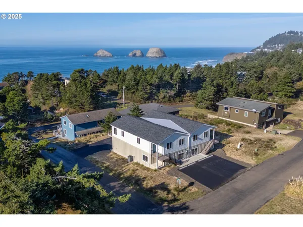 an aerial view of a house with a garden