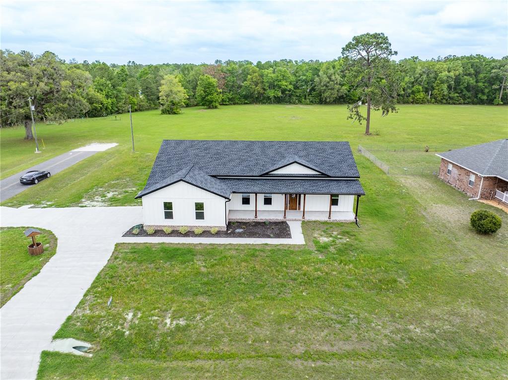 151 Southwest Scott Place Lake City, FL 32024 - Photo 1 of 47 an aerial view of a house with a garden