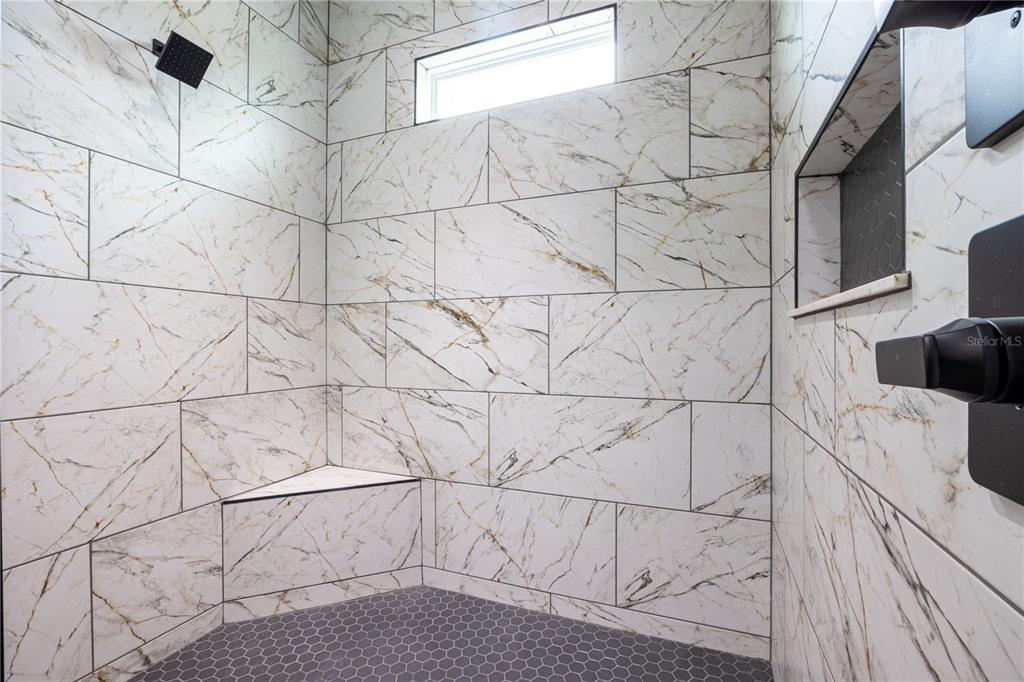 151 Southwest Scott Place Lake City, FL 32024 - Photo 20 of 47 a bathroom with a bathtub and shower
