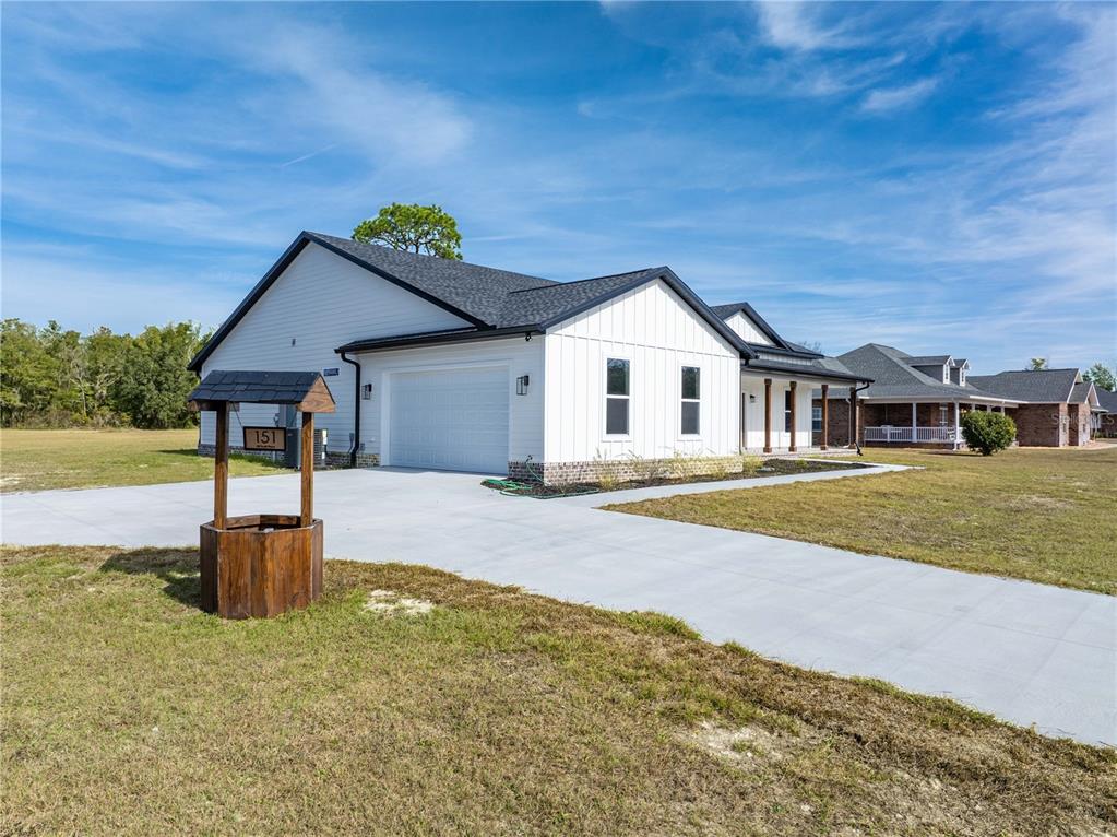 151 Southwest Scott Place Lake City, FL 32024 - Photo 33 of 47 a house with swimming pool in front of it