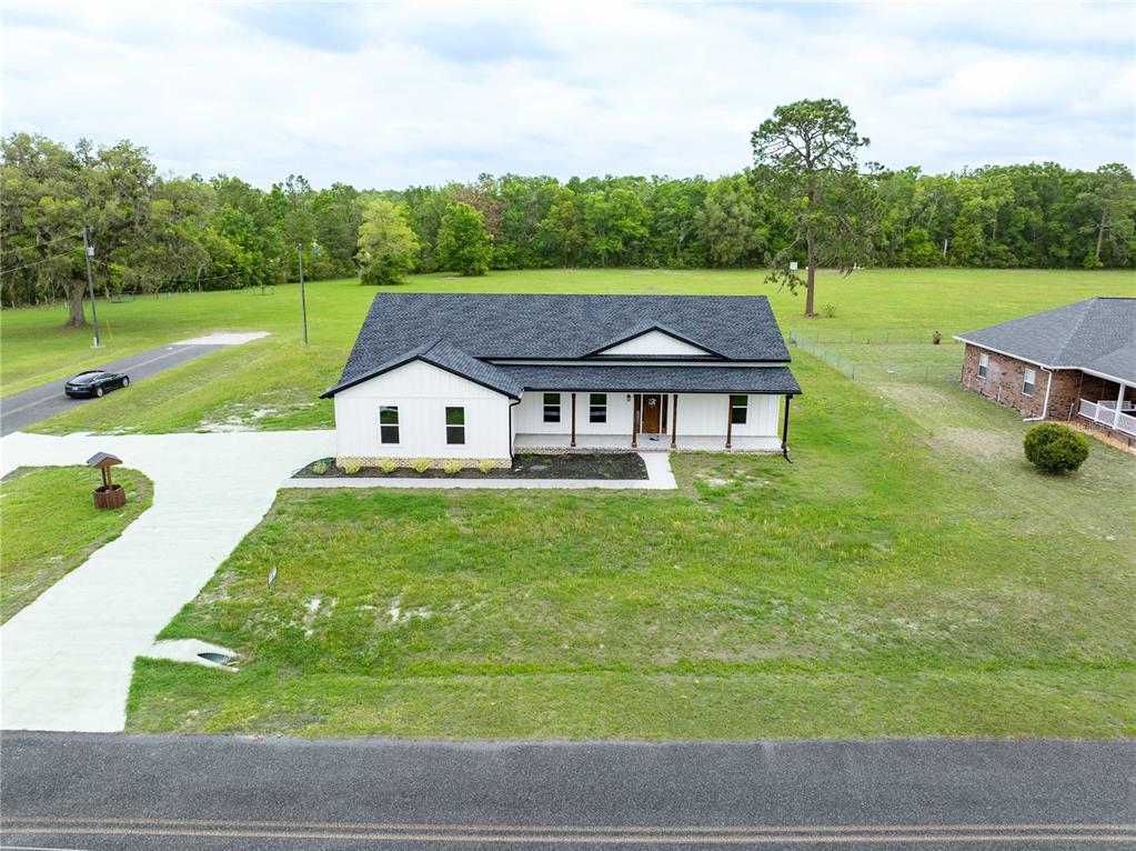 151 Southwest Scott Place Lake City, FL 32024 - Photo 43 of 47 a aerial view of a house with yard and lake view
