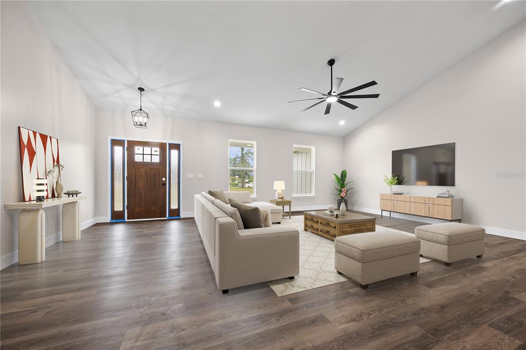 151 Southwest Scott Place Lake City, FL 32024 - Photo 5 of 47 a living room with furniture and a flat screen tv
