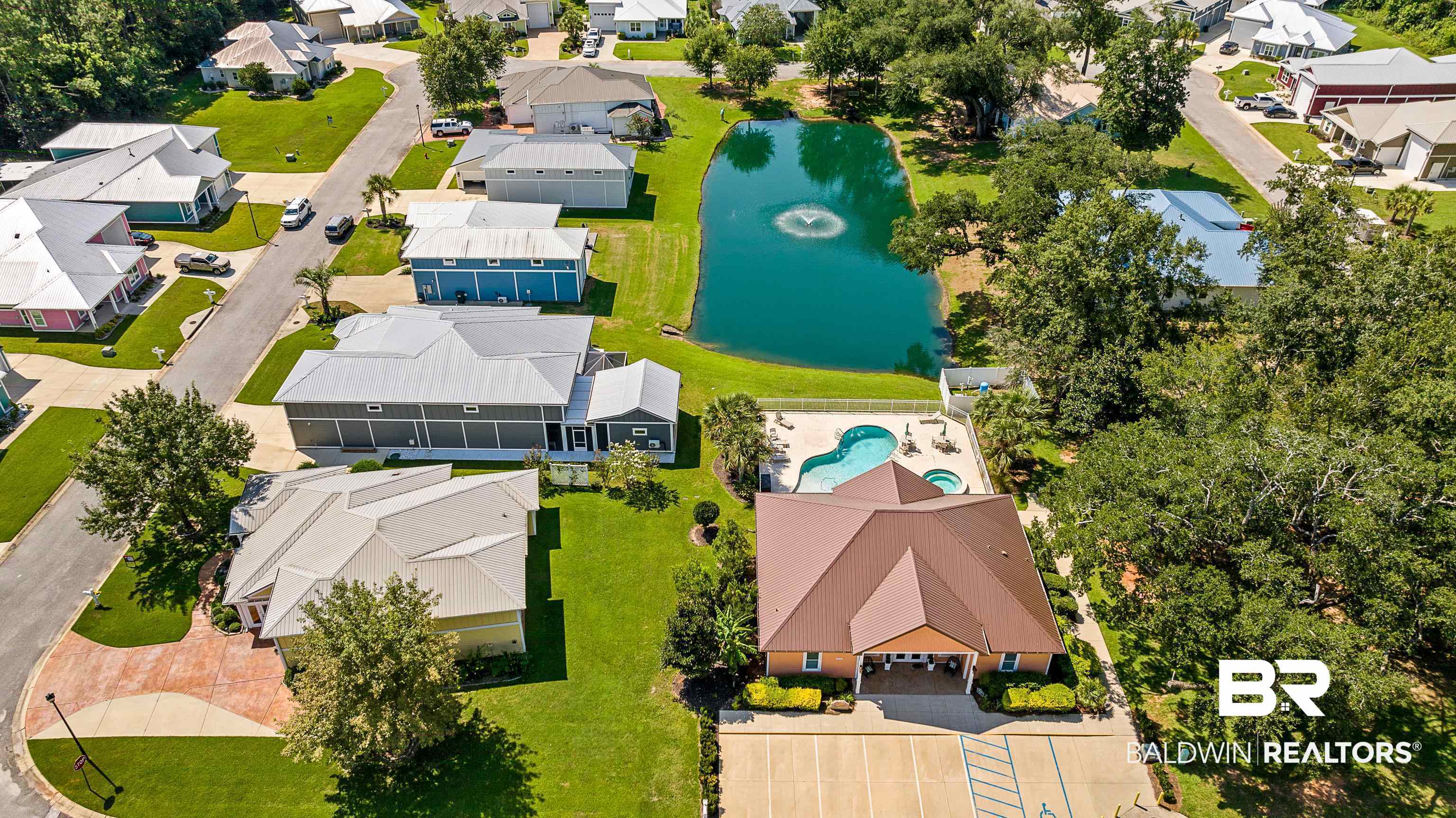 12329 Reunion Place, Unit LOT 38 Foley, AL 36535 - Photo 42 of 43 Aerial view of residential area with a nearby body of water