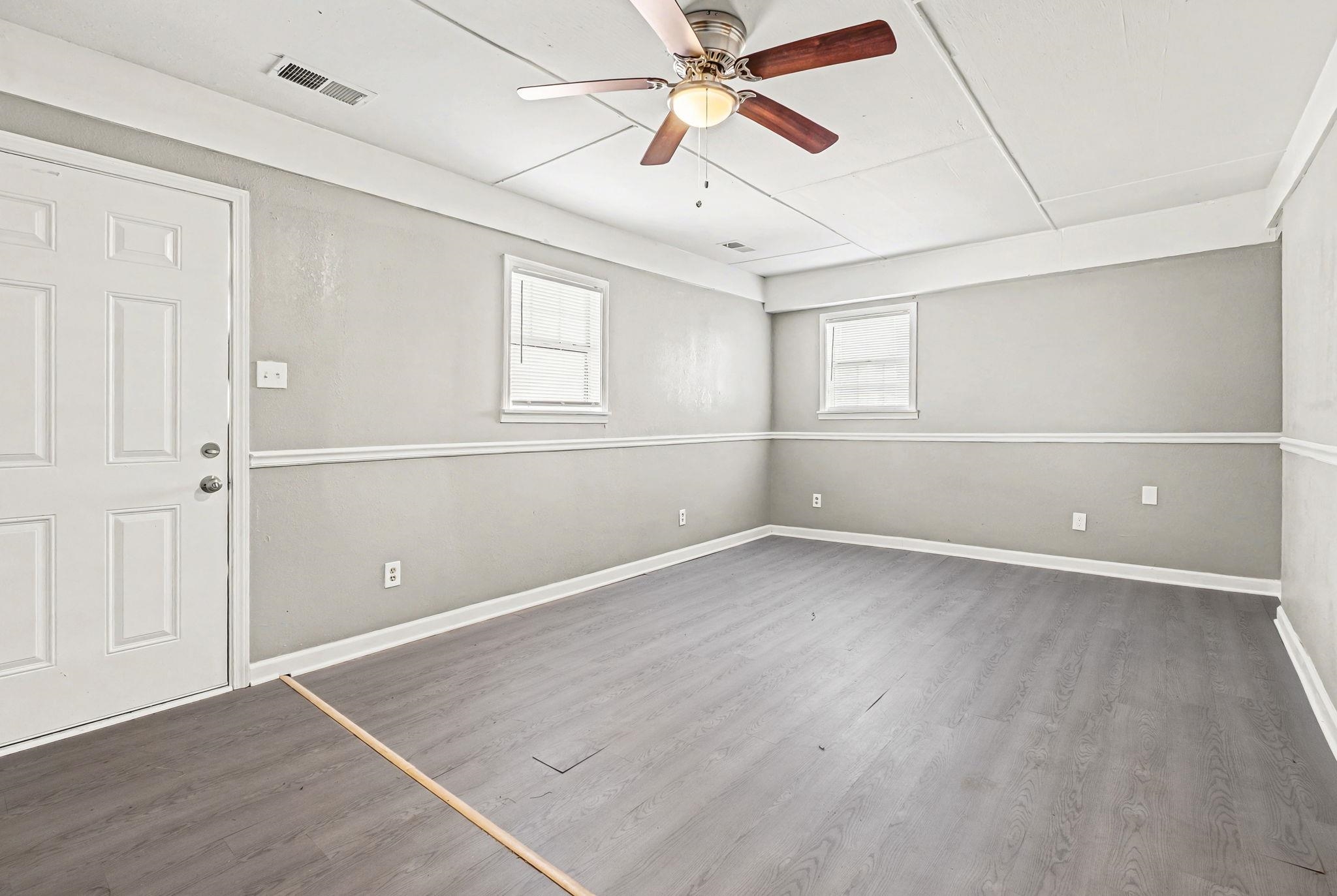 6733 Navy Road Millington, TN 38053 - Photo 25 of 25 an empty room with a empty space and windows