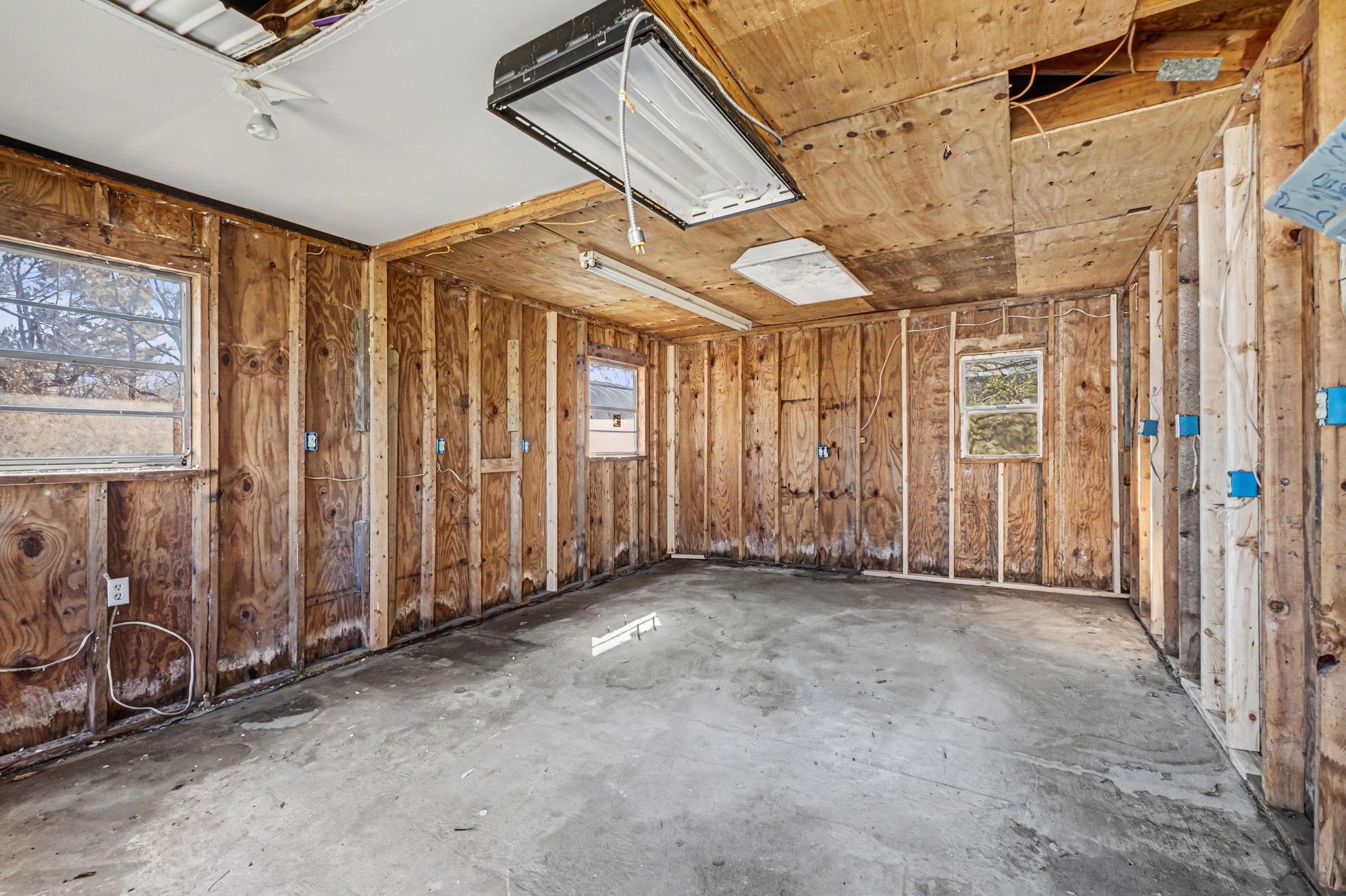 6733 Navy Road Millington, TN 38053 - Photo 10 of 25 a view of a room with wooden walls