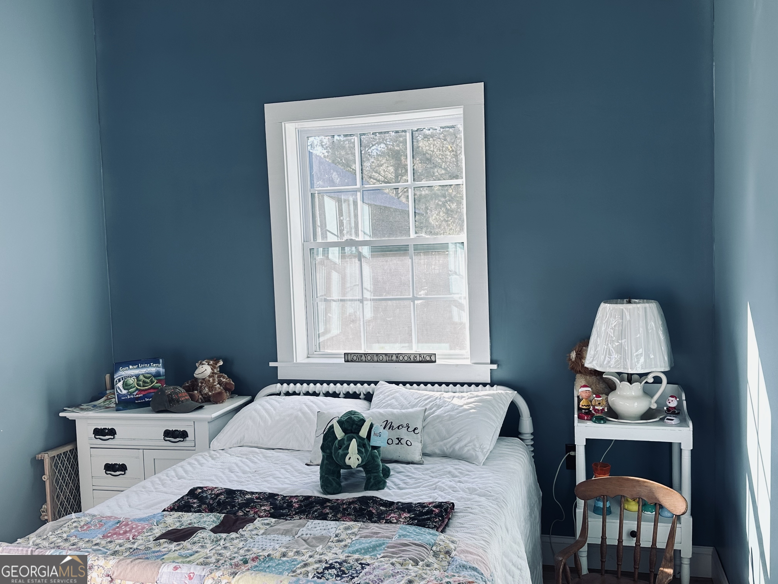 213 Fredonia Church Road Barnesville, GA 30204 - Photo 21 of 32 a bedroom with a bed and a window