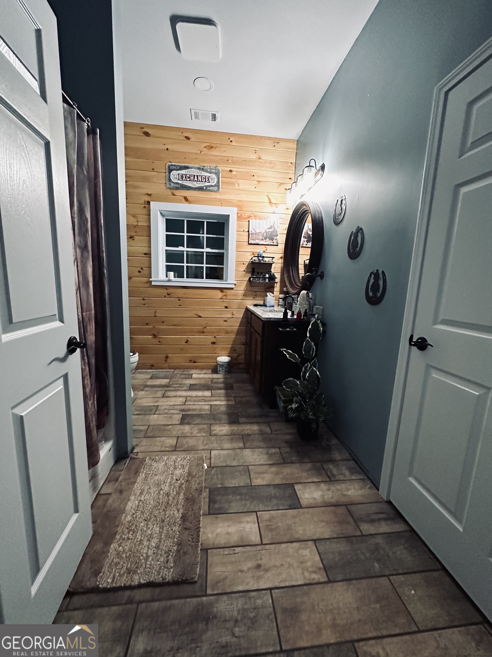 213 Fredonia Church Road Barnesville, GA 30204 - Photo 22 of 32 a view of bathroom with mirror and window