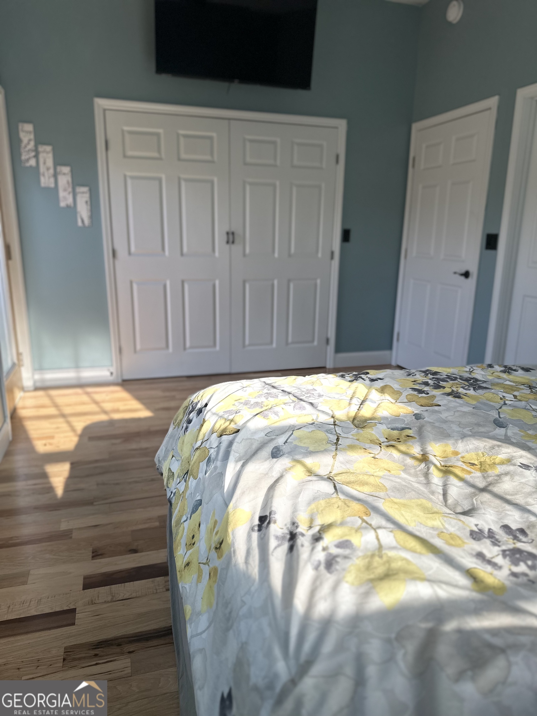 213 Fredonia Church Road Barnesville, GA 30204 - Photo 25 of 32 a bedroom with a bed and a cabinets