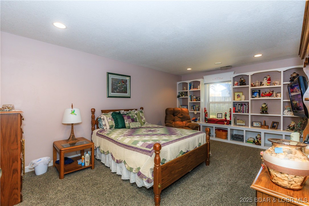 23 Leisure Road Eldon, MO 65026 - Photo 17 of 58 Bedroom 2 with custom built ins