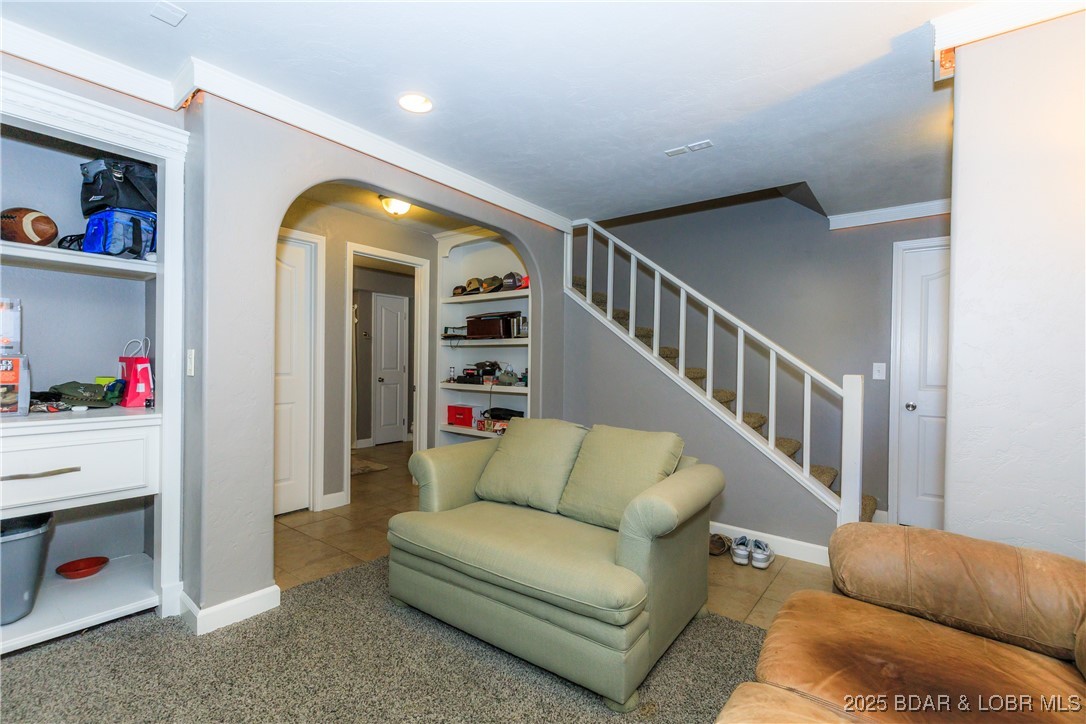 23 Leisure Road Eldon, MO 65026 - Photo 22 of 58 Lower level living room.