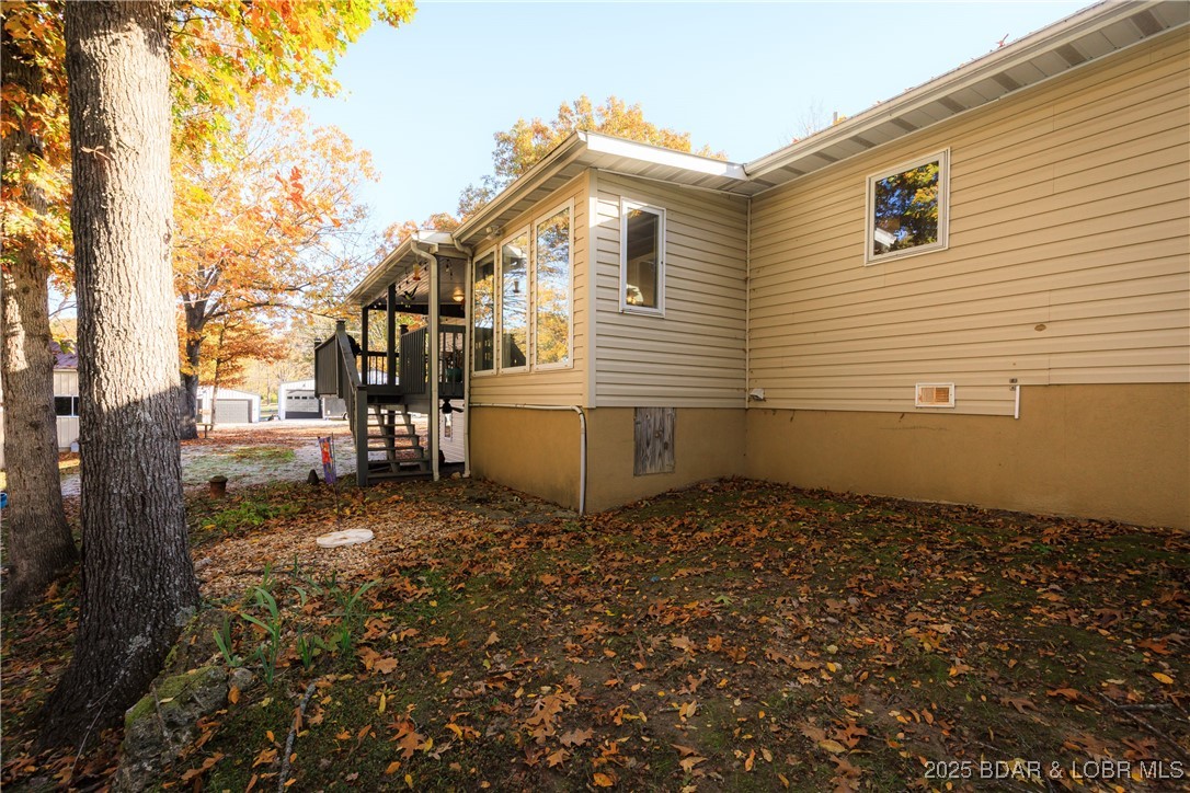 23 Leisure Road Eldon, MO 65026 - Photo 39 of 58 Stairs leading up to Covered Porch