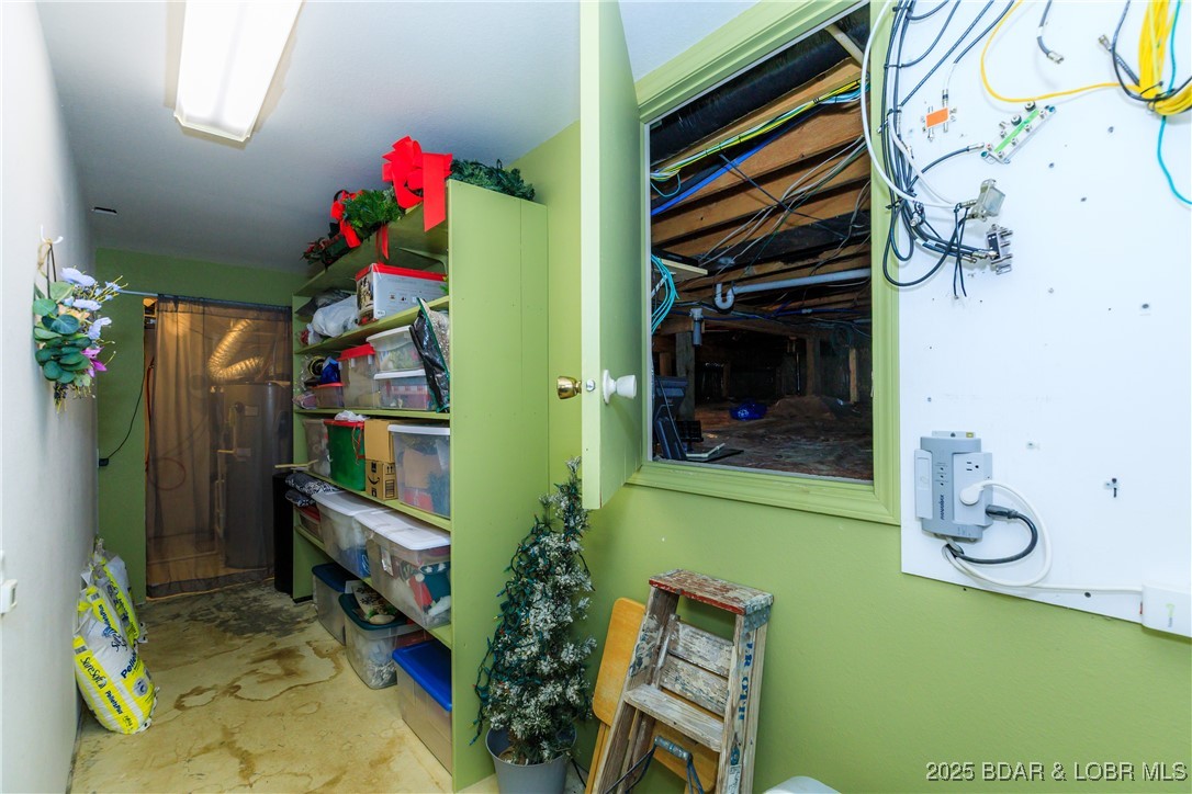 23 Leisure Road Eldon, MO 65026 - Photo 57 of 58 Lower level Utility room and large crawl space for
