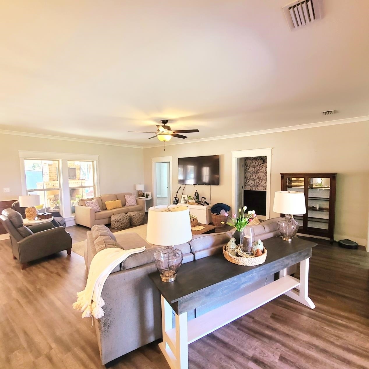 10051 Blackwell Nursery Road Semmes, AL 36575 - Photo 38 of 54 Living room featuring ornamental molding, wood finished floors, and a ceiling fan