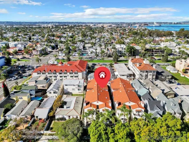 an aerial view of residential building and parking space